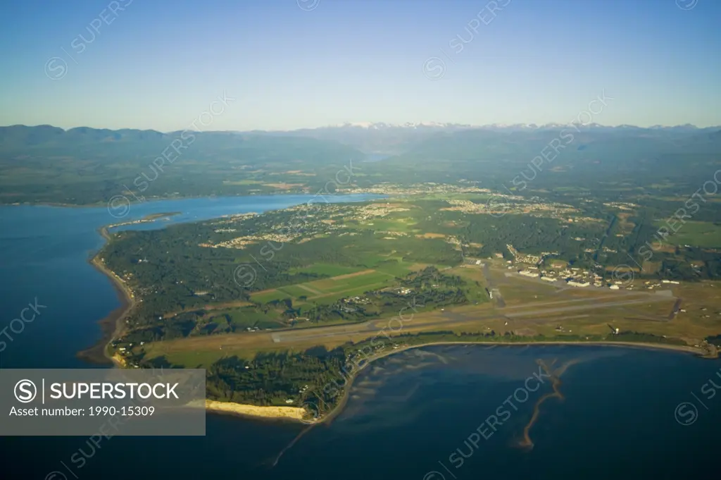 An aerial view of the Comox Peninsula, including CFB Comox and Kye Bay on the eastern shores of Vancouver Island, Comox, Vancouver Island, British Col...