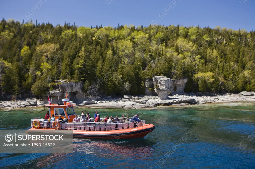 Zodiac, inflatable tour boat, offshore from Flowerpot Island in the Fathom Five National Marine Park, Lake Huron, Ontario, Canada.