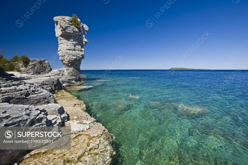 Sea stack along the shoreline of Flowerpot Island in the Fathom Five National Marine Park, Lake Huron, Ontario, Canada