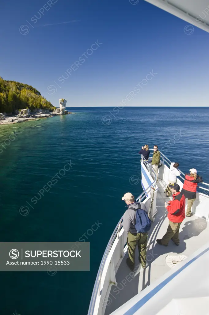 Passengers aboard the Great Blue Heron tour boat from Tobermory in the Fathom Five National Marine Park, Lake Huron, Ontario, Canada