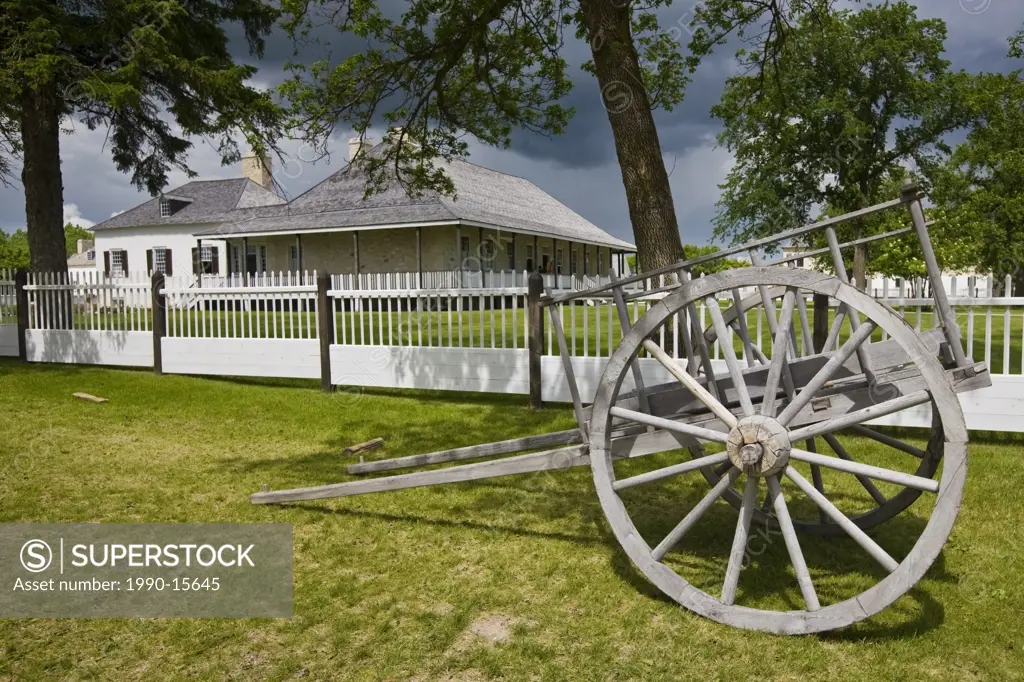 Big House and old wagon, Lower Fort Garry, a National Historic Site, Selkirk, Manitoba, Canada