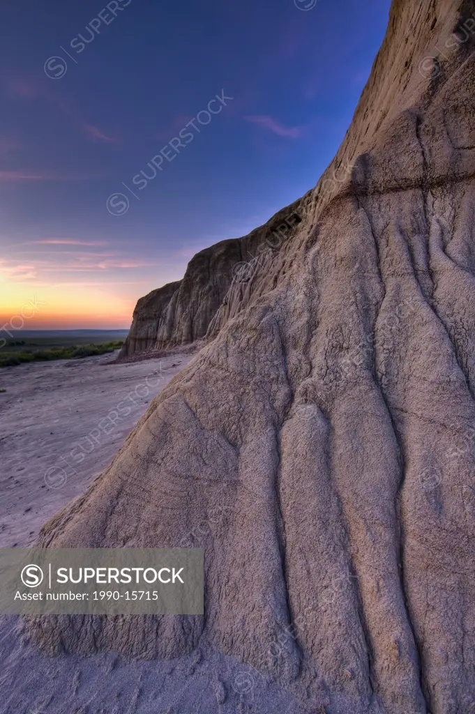 Formations and patterns on Castle Butte at sunset in Big Muddy Badlands, southern Saskatchewan, Canada