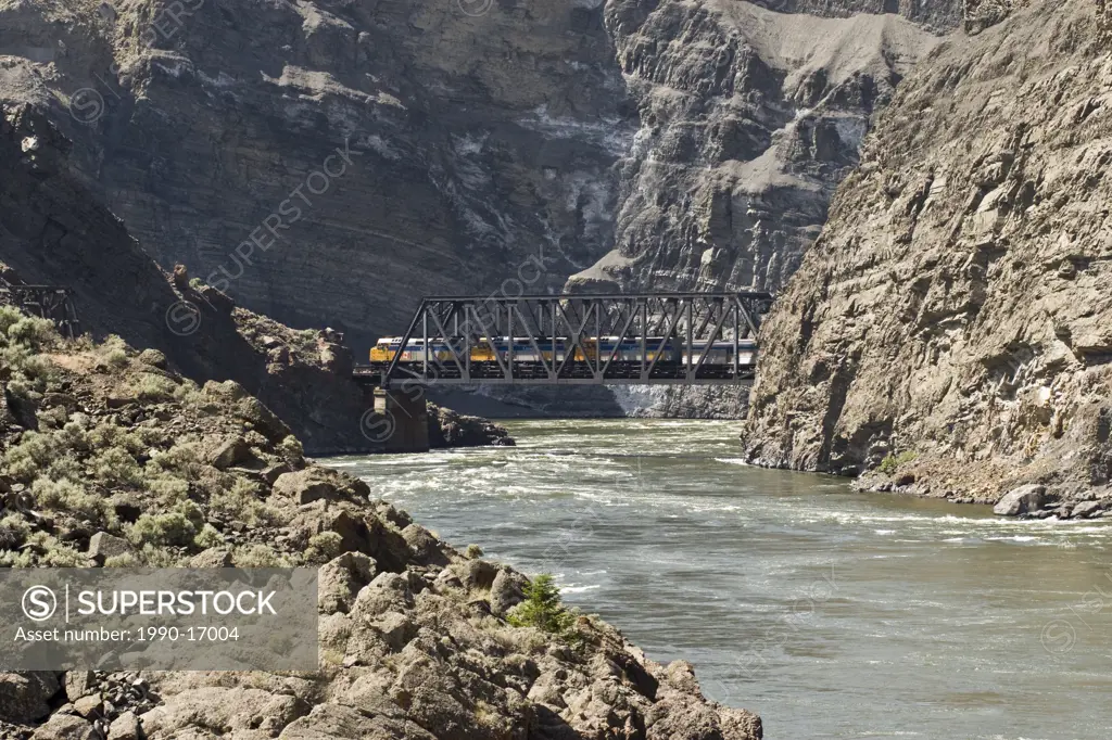 Train going over a trestle in the Black Canyon near town of Ashcroft in British Columbia, Canada