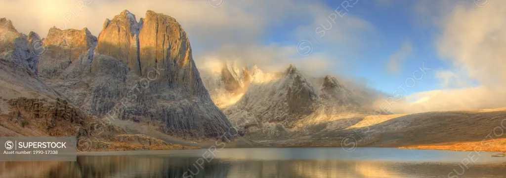 Divide Lake at sunrise with Mount Monolith towering above it. Tombstone Territorial Park, Yukon.