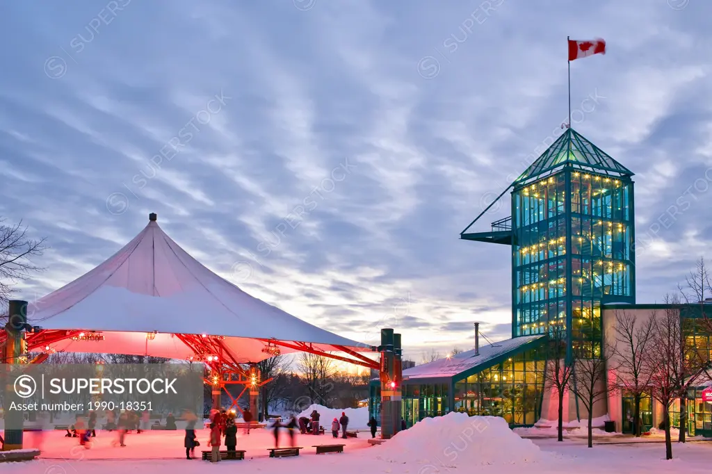 Ice Skaters under the Pavillion canopy at The Forks, Winnipeg´s most popular tourist destination, in all seasons. Winnipeg, Manitoba, Canada.