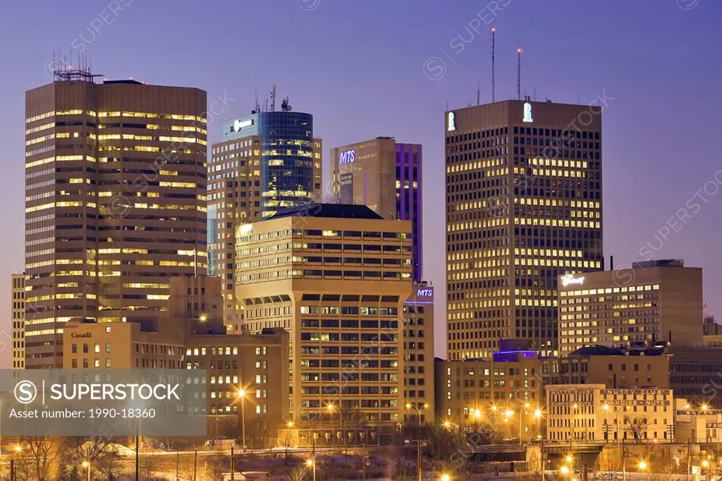 Skyline of downtown Winnipeg, Manitoba, Canada at night, looking towards Portage and Main Street.