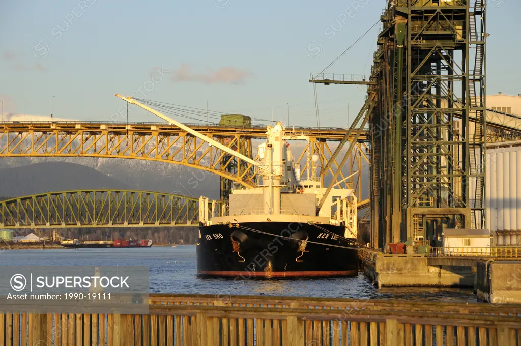 Ship loading at grain elevator, Vancouver, British Columbia, Canada