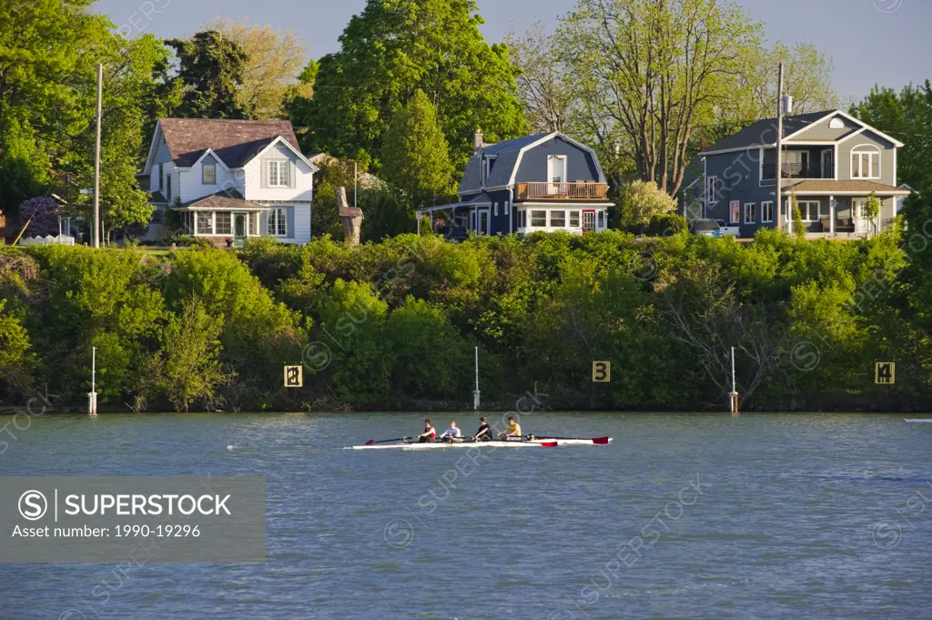 Rowers on Canadian Henley Regatta course on Martindale Pond, Port Dalhousie in St. Catharines, Ontario, Canada.