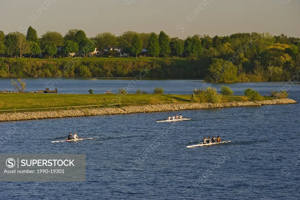 Rowers on Canadian Henley Regatta course on Martindale Pond in the community of Port Dalhousie in St. Catharines, Ontario, Canada.