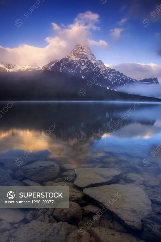 Mount Chephren is reflected in Water Fowl Lake along the Icefields Parkway in Banff National Park, Alberta, Canada