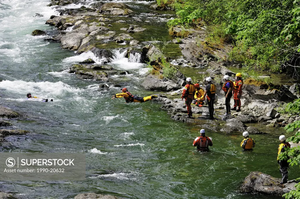 A Search and Rescue team training in the Cowichan River near Skutz Falls near Lake Cowichan, BC.