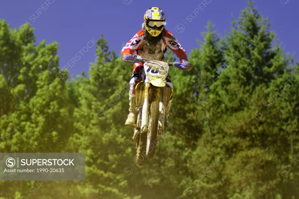 motocross racer at a jump during motocross action at the Wastelands in Nanaimo, BC.