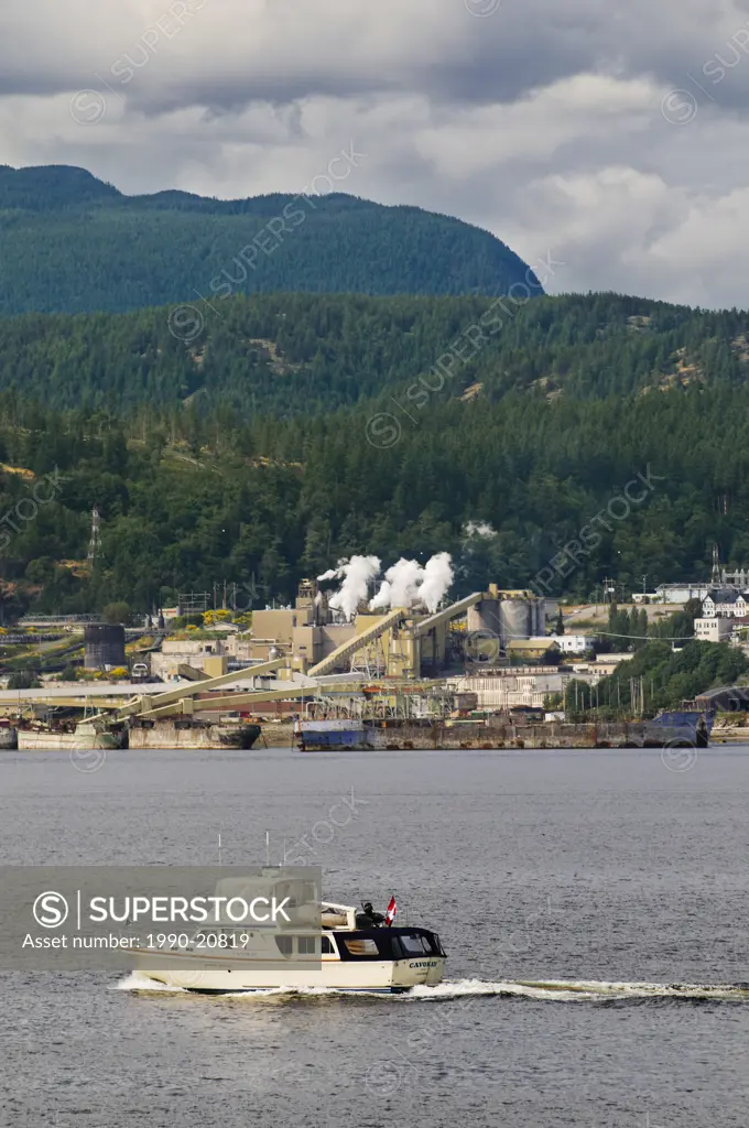 Recreational boating, a popular activity along the Sunshine Coast, including here in Powell River, BC. Powell River´s Pulp and Paper Mill shown in the...