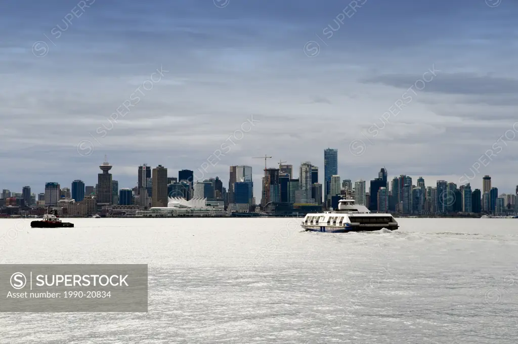 A Seabus crosses the Vancouver harbour towards downtown Vancouver.
