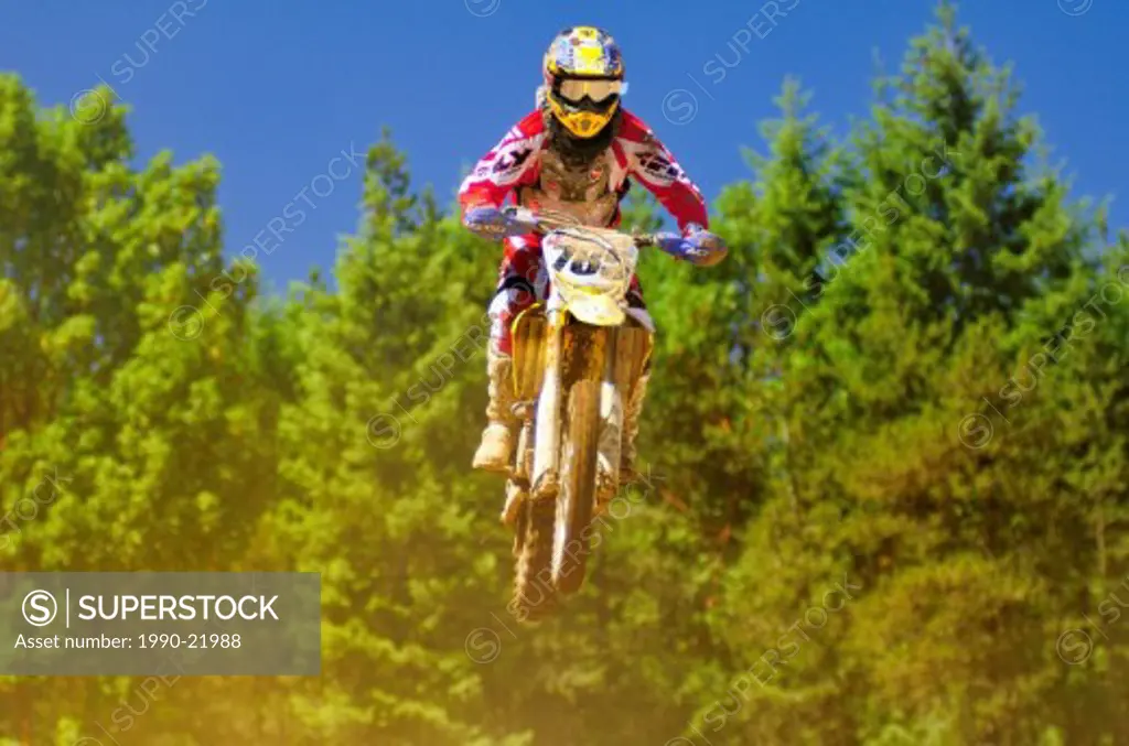 motocross racer at a jump during motocross action at the Wastelands in Nanaimo, BC.