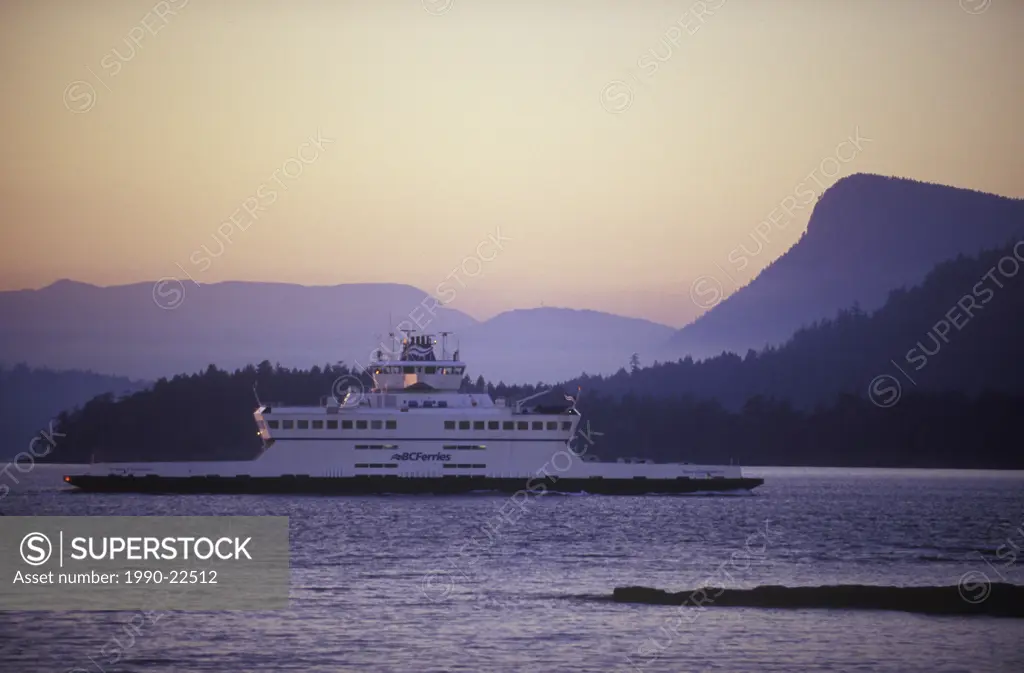 BC Ferry enroute to Fulford Harbour, Saltspring Island from Swartz Bay, near Victoria at twilight, British Columbia, Canada