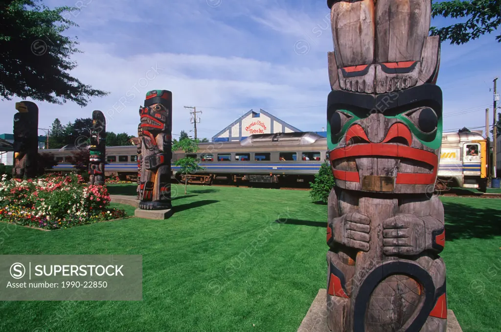 Duncan train station - E&N Dayliner and totems, Vancouver Island, British Columbia, Canada