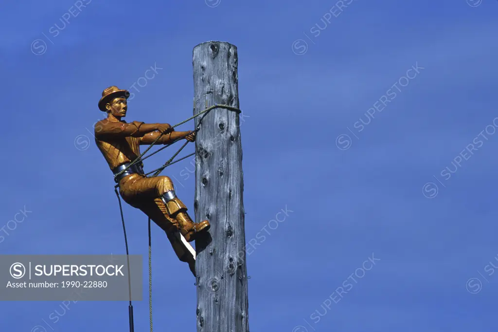Campbell River, carving of logger on spar pole, Vancouver Island, British Columbia, Canada