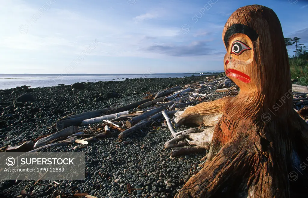 carving on beach which prompted the driftwood carving festival, Campbell River, Vancouver Island, British Columbia, Canada