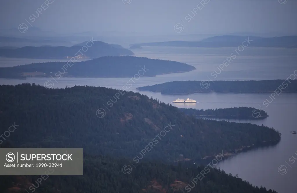 Saltspring Island, view east at dusk with spirit class ferries in active pass, British Columbia, Canada