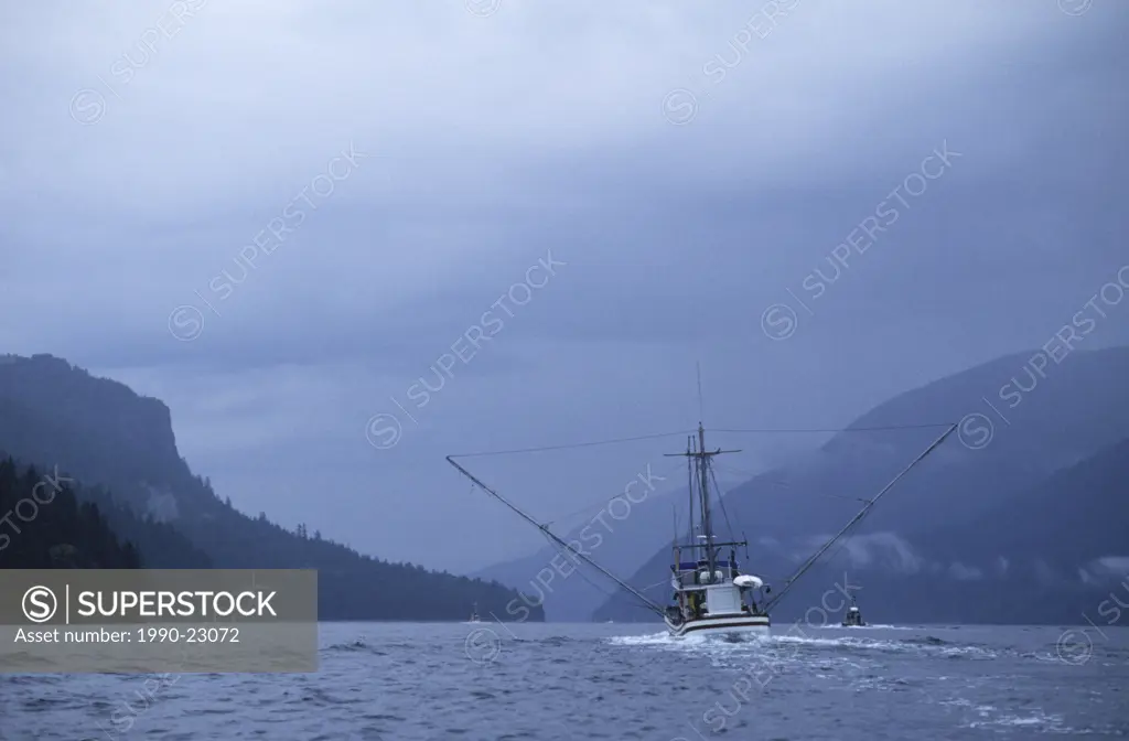 Vancouver Island fishboat heads up Johnstone Starit, British Columbia, Canada