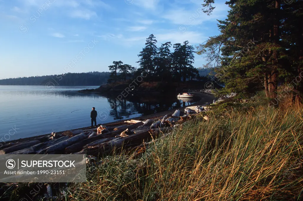 boater on beach, Pender Island, Beaumont Park, Gulf Islands National Park, British Columbia, Canada