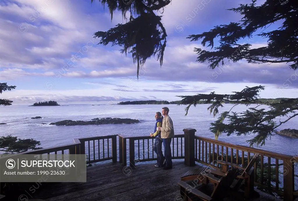 Middle Beach Lodge Resort guests enjoy vista of Pacific Ocean from sun deck, Tofino, Vancouver Island, British Columbia, Canada