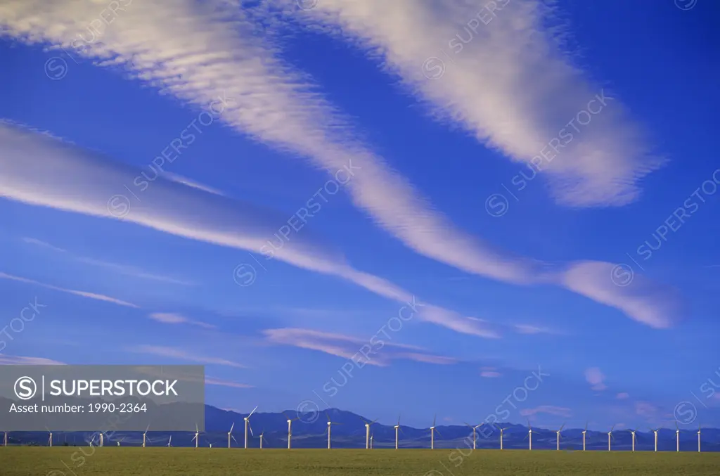 Wind Turbines against Rocky Mountains in Southern Alberta, Canada