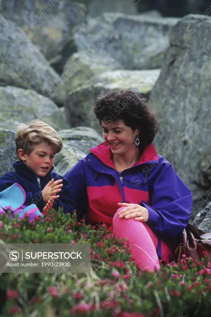 mother and son in heather, Whistler Mountain, British Columbia, Canada