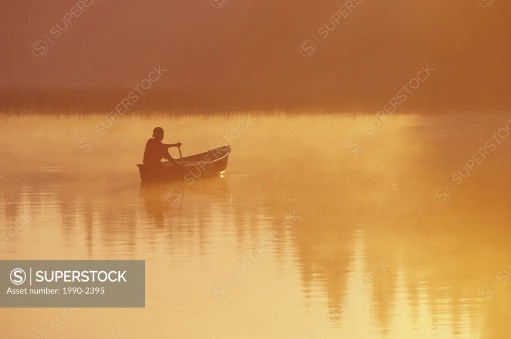 Canoeing on childs lake, duck mountain provincial park, manitoba, Canada