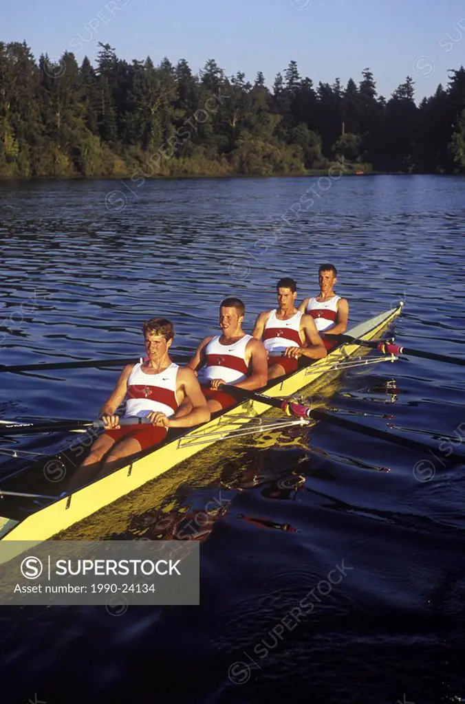 Rowers on lake  Elk Lake, Victoria , Canada Junior Men´s fours team, Vancouver Island, British Columbia, Canada