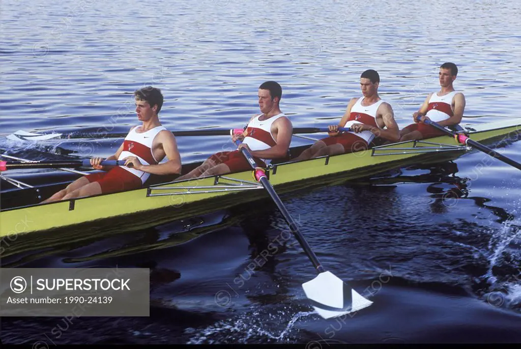 Rowers on lake  Elk Lake, Victoria , Canada Junior Men´s fours team, Vancouver Island, British Columbia, Canada