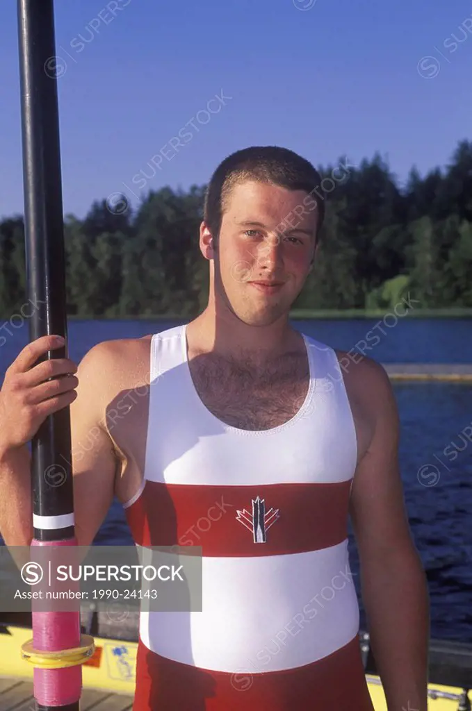 Rower on lake  Elk Lake, Victoria , Canada Junior Men´s fours crew, Vancouver Island, British Columbia, Canada