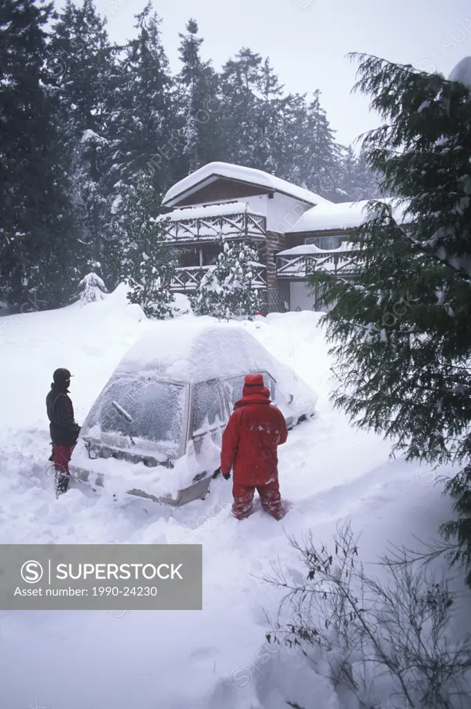 Sidney, rare snowstorm, residents dig out car, Vancouver Island, British Columbia, Canada