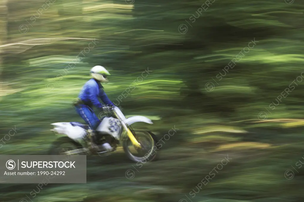 Motocross rider, panned shot with background motion blur, British Columbia, Canada