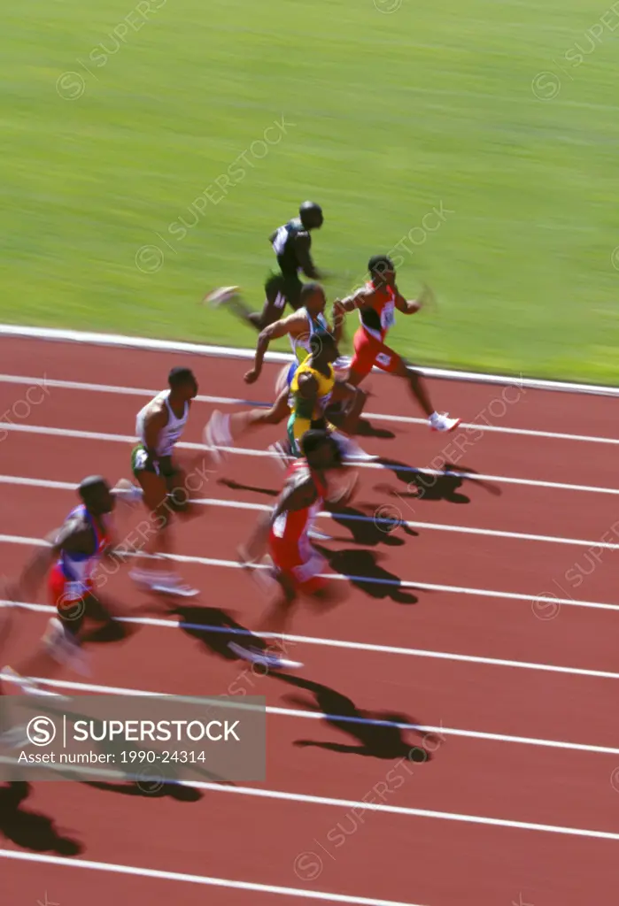 100 M men´s sprint at track competion  Motion blur, rust track, British Columbia, Canada