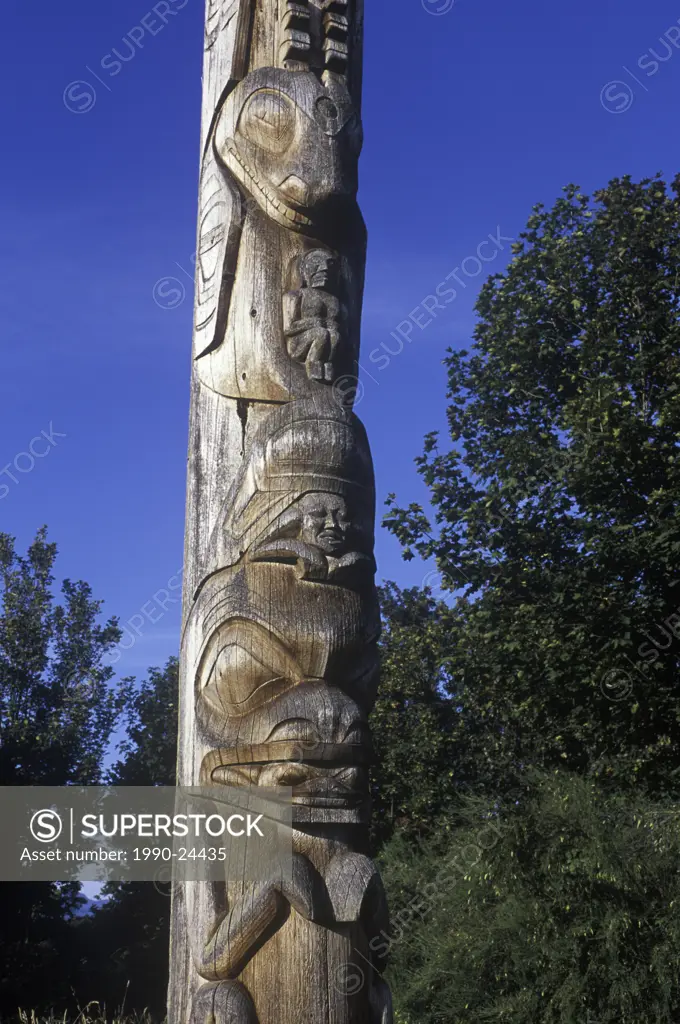 Totem poles on the grounds of the University of British Columbia Museum of Anthropology, British Columbia, Canada