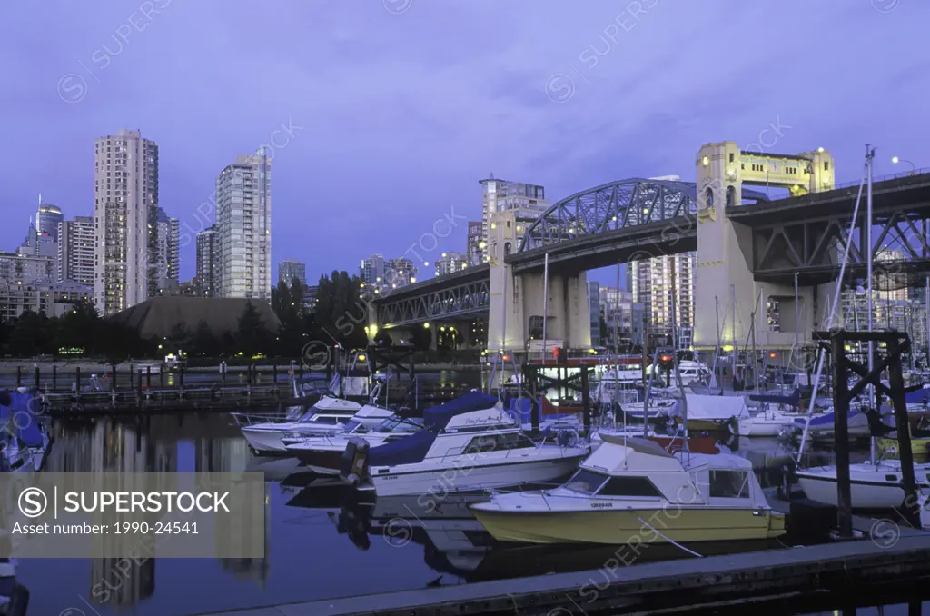 entrance of False Creek and West End condos with Burrard Bridge and marina, Vancouver, British Columbia, Canada