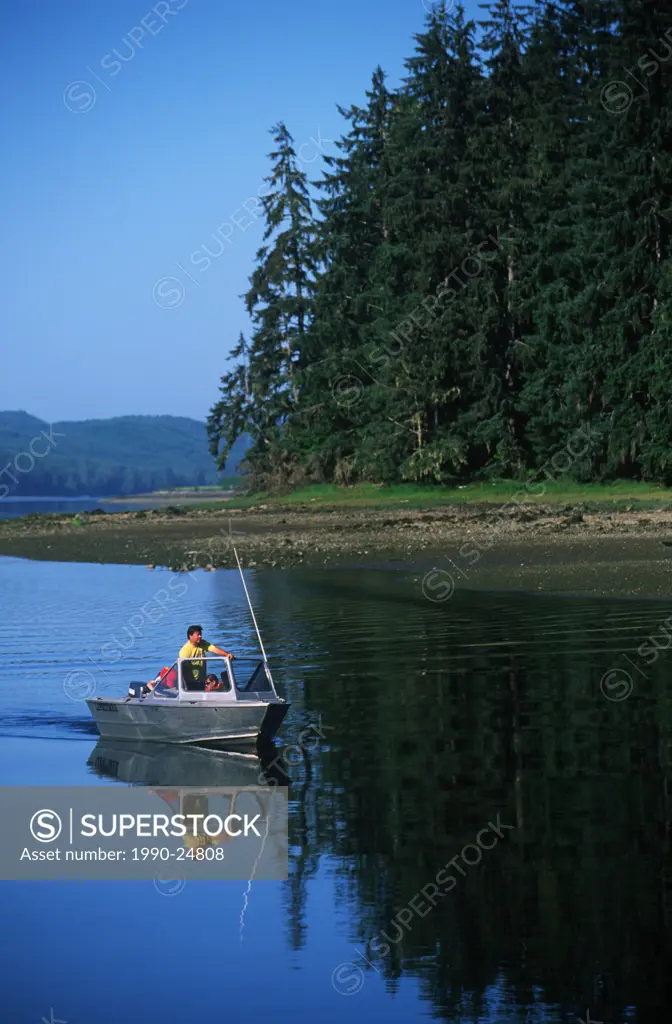 Rupert Inlet, with recreatioanl boater, Vancouver Island, British Columbia, Canada