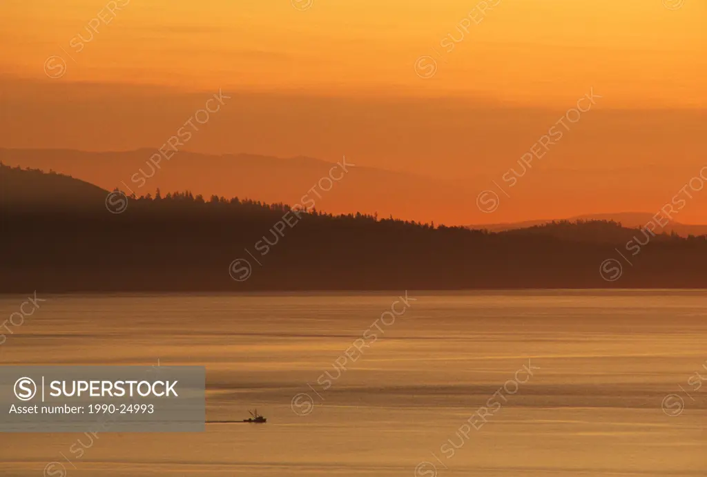 Fishing Troller on the Haro Strait with layered hills beyond, Victoria, Vancouver Island, British Columbia, Canada