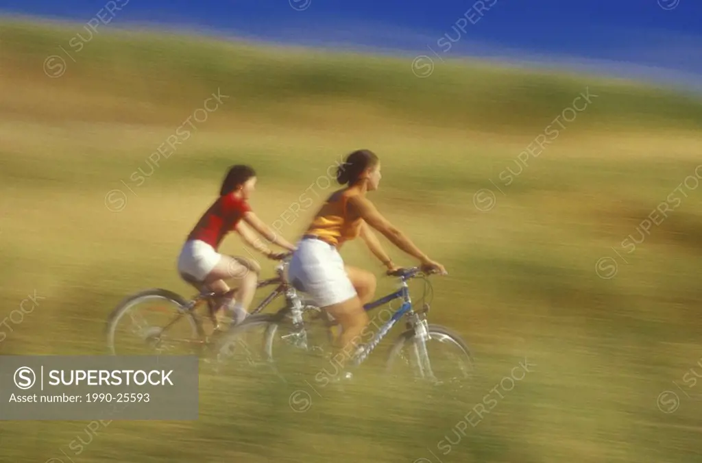 Bicycle riding at 108 Mile Lake, British Columbia, Canada