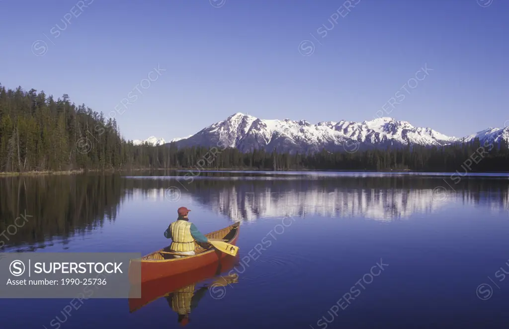 canoeing on Wilderness Lake, Chilcotin region, British Columbia, Canada