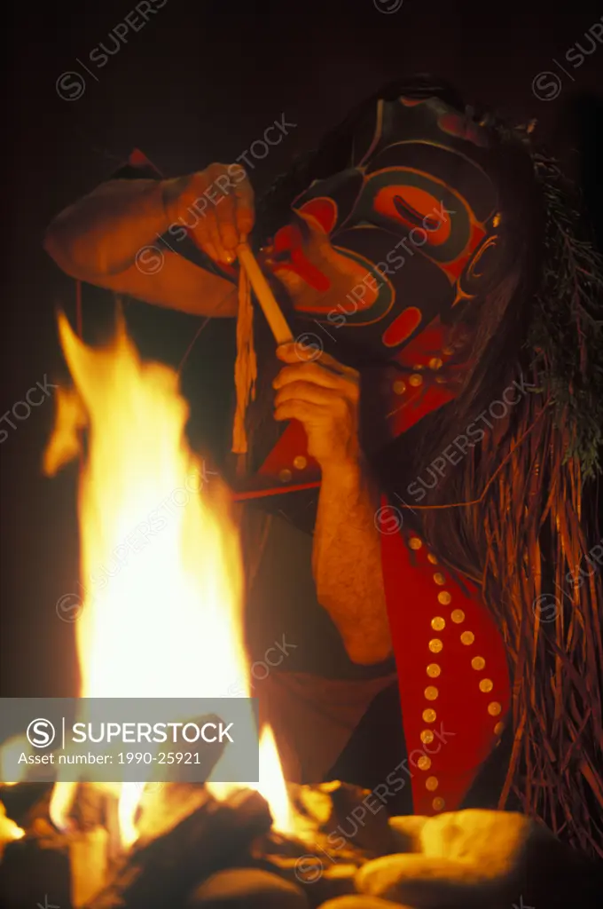 Bookwus, Native dancer at fire, British Columbia, Canada