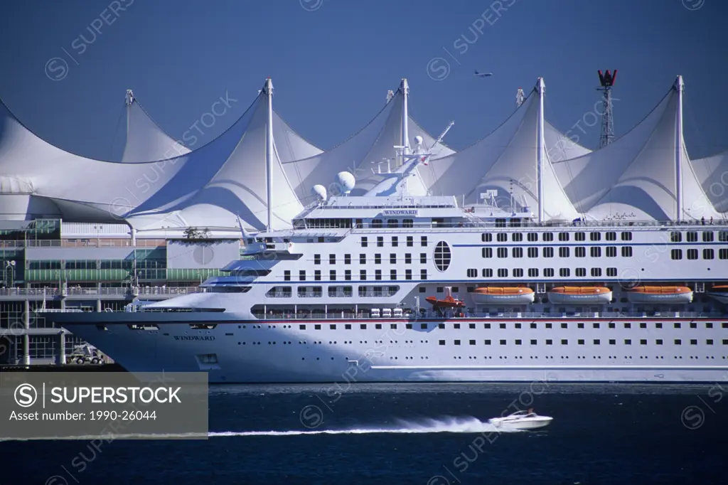 A cruise ship docks at Canada Place, on Vancouver´s bustling waterfront, as seen from the Stanley Park seawall, British Columbia, Canada