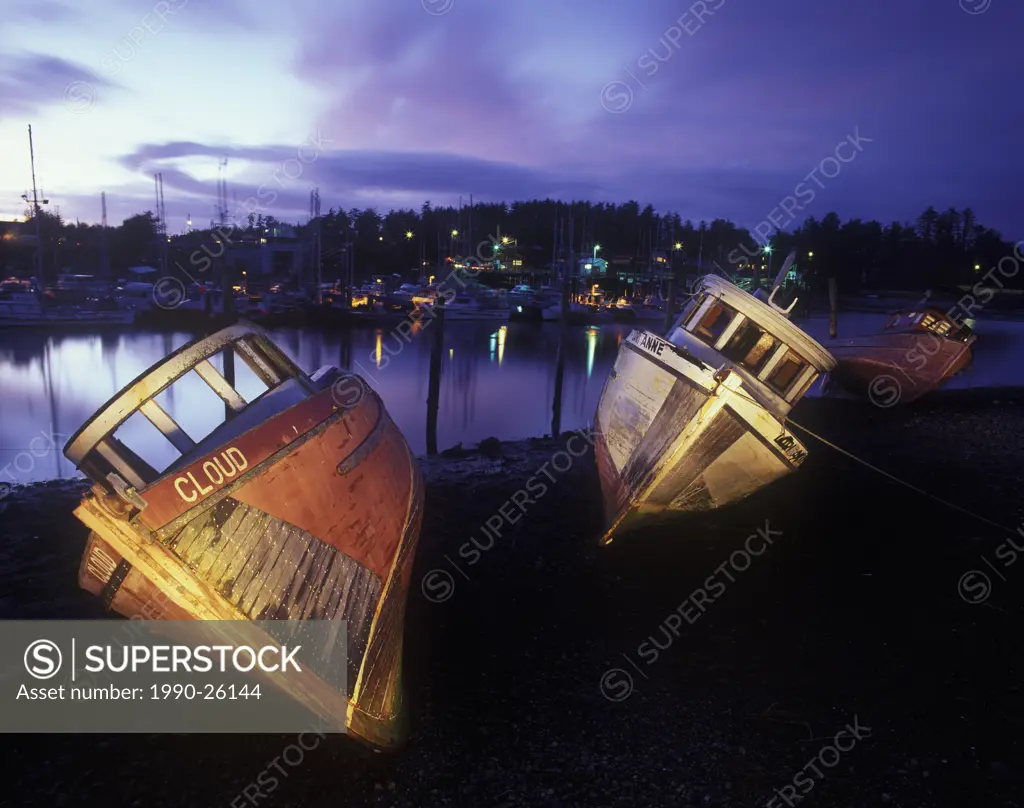 Abandoned fishing boats at night, Masset, Haida Gwaii, British Columbia, Canada