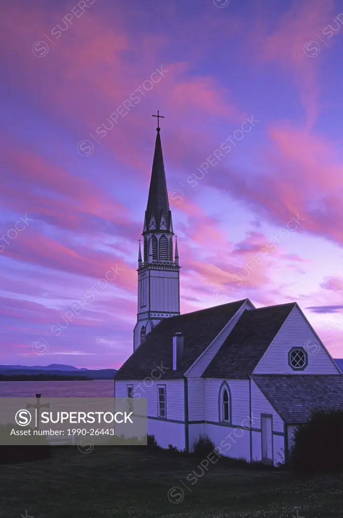 Lady of Good Hope Catholic Church built 1873 and Stuart Lake at sundown, Fort St James, British Columbia, Canada