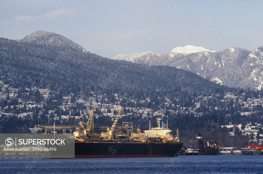 Cargo ship anchored off the West End of Vancouver, British Columbia, Canada