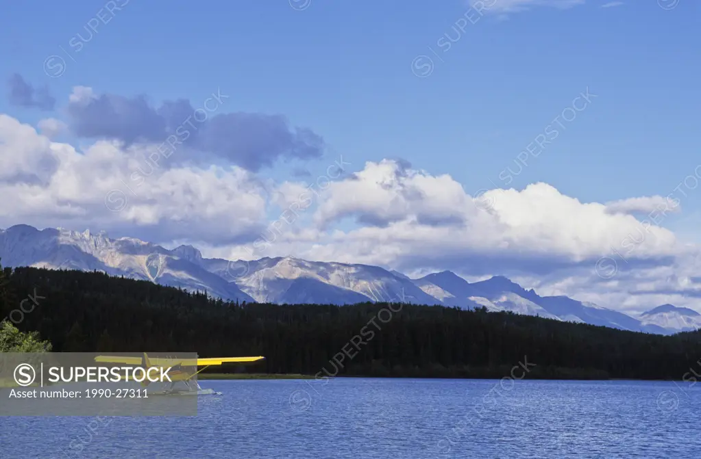 Float plane taking off from Mayfair Lakes, Muskwa Kechika Wilderness, Northern Rockies, British Columbia, Canada