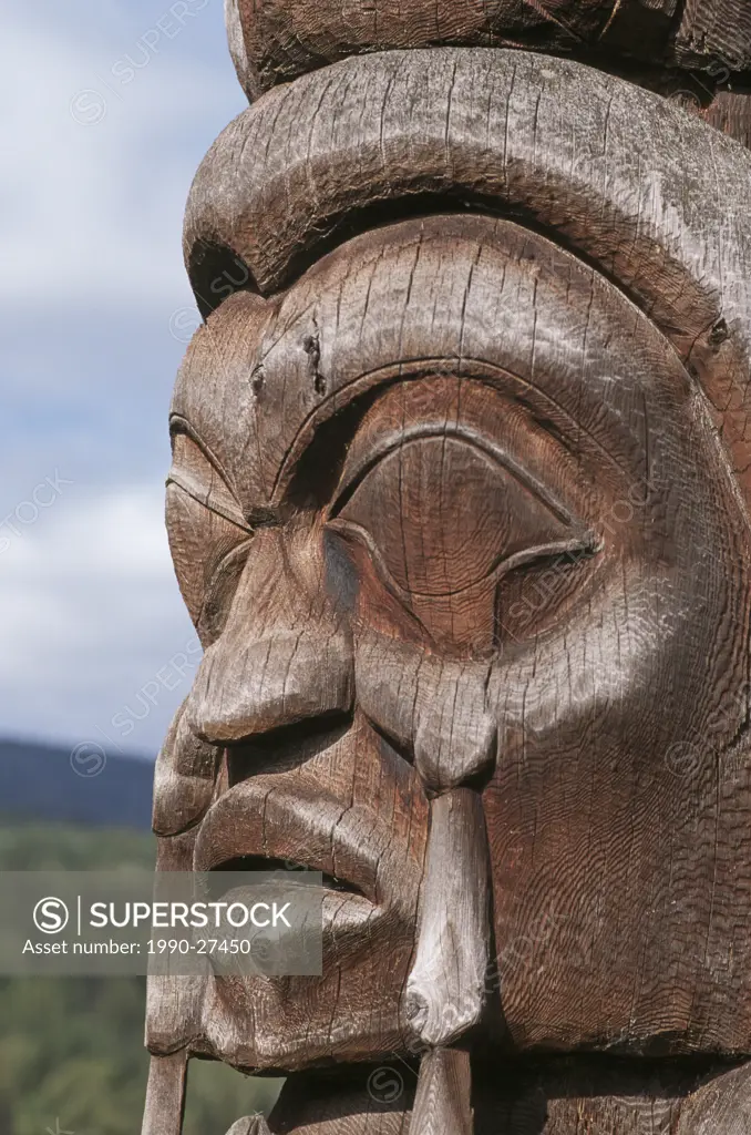 Detail of Totem pole face, British Columbia, Canada