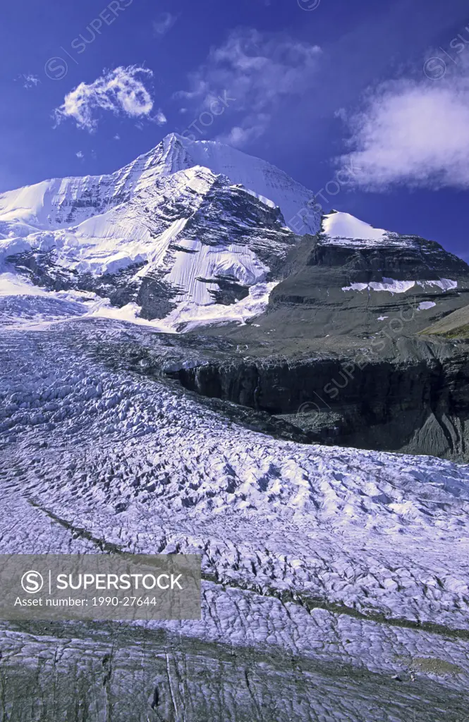 Like a river of ice, the heavily crevassed Robson Glacier seems to flow down the east face of 3954 metre/12969 ft Mount Robson, the highest peak in th...
